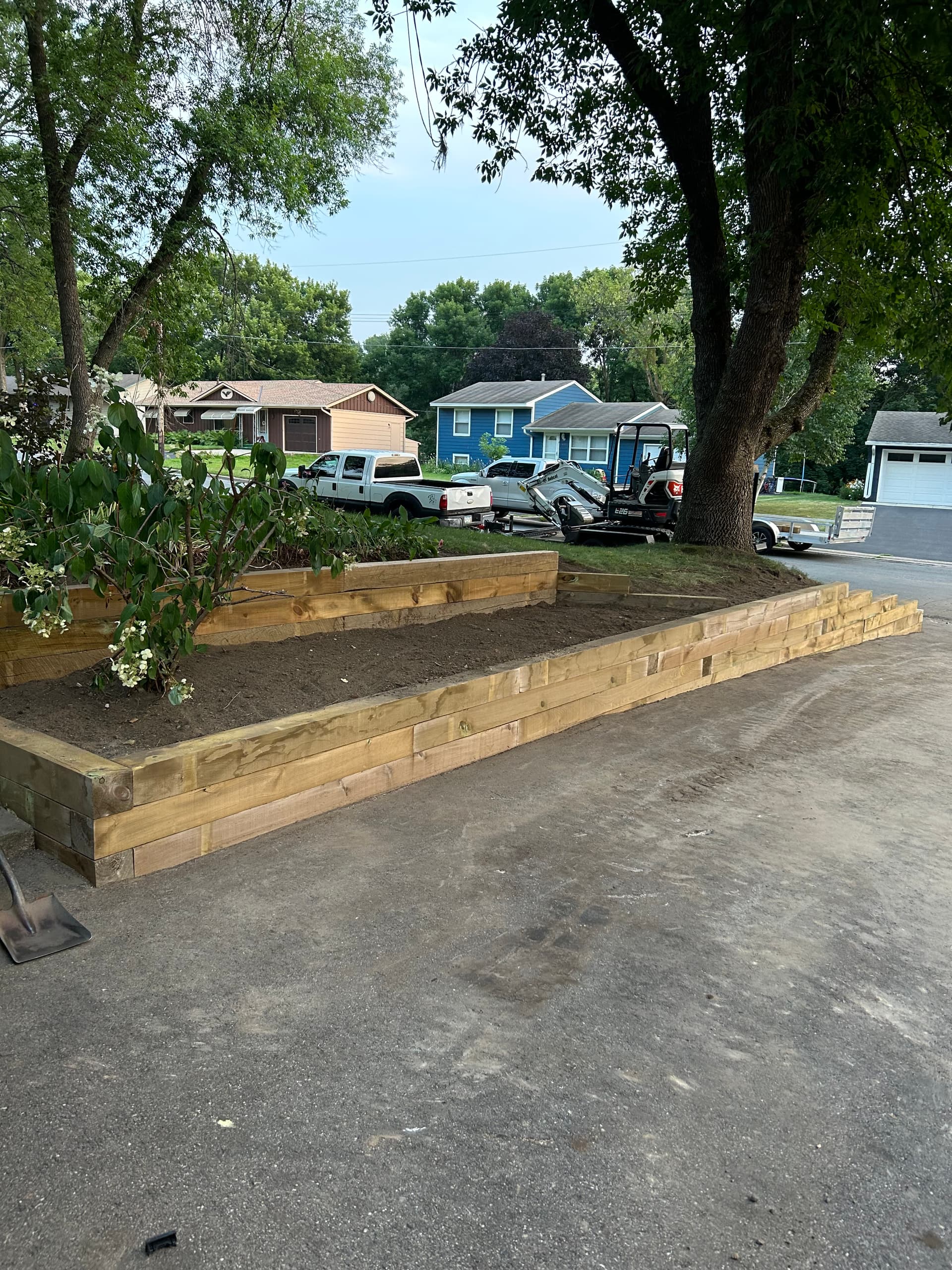 Finished timber retaining wall, rebuilt square and level