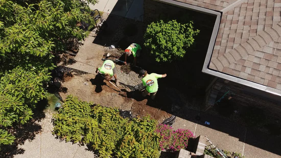 Aerial view of the crew rebuilding a front bed